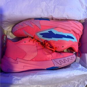 Vibrant Pink Sneakers with Blue Accents
